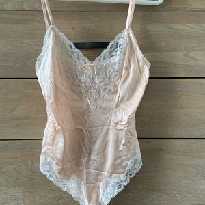 Elegant Lace Trimmed Pink Bodysuit